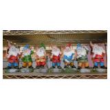 7 garden yard art working gnomes,