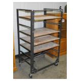 Rolling angle iron shelving unit with plywood