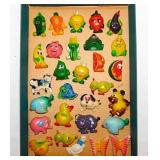 Vintage plastic refrigerator magnets: