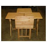 Set of 4 wooden folding TV trays, one new in pkg.
