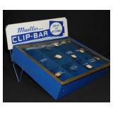 Mueller Clip-Bar advertising container, 14" x 13"
