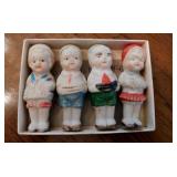 Antique bisque dolls: Set of 4 Frozen Charlotte