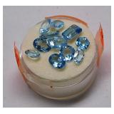 11 blue topaz gemstones, emerald cut, ovals & more