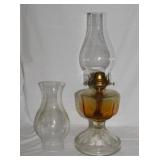 Antique glass oil lamp & 2 chimneys