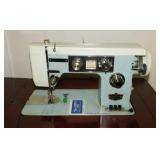 Vintage Dressmaker sewing machine in table stand,