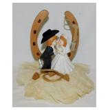 Western style Cowboy wedding: Horseshoe cake