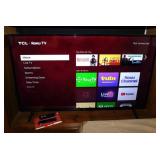 2019 TCL 50" Roku 4K smart TV television on stand