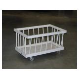 Vintage shabby chic doll crib on casters,
