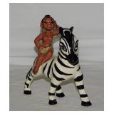 Vintage topless Tribal African girl on zebra