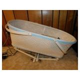 Vintage wicker baby bassinet w/ wheels & sheets,