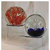 2 blown glass paperweights: one is Dynasty Gallery
