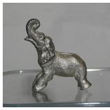 18 miniature pewter elephant figurines, tallest