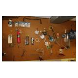 Contents on pegboard: Fire extinguisher - Tape -