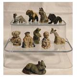 10 miniature figurines: Lion - Scottish Terrier -