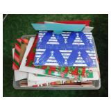 Storage tote full of Christmas gift boxes