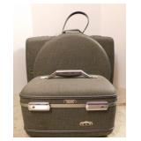 3 piece American Tourister luggage: Suitcase -