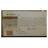 Antique legal documents in protective sleeves: