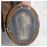 Antique military photo in oval carved walnut