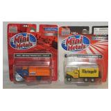 12 New HO scale Mini Metals trucks & vans on
