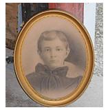 Antique charcoal portrait drawing of young boy in