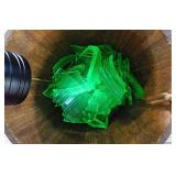 Broken Uranium glass in wooden sap bucket,
