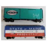 2 metal railroad train freight box cars