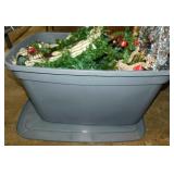 Storage tote w/ lid full of Christmas decor: