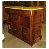 Custom made carved walnut kitchen island w/ marble