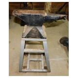 No. 8 anvil on rolling metal stand, top is 18"