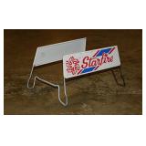 Vintage metal Starfire tire display sign stand