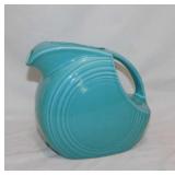 Vintage turquoise HLC Fiesta disc pitcher, 7.5"