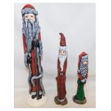 3 hand painted ceramic slender Santa Claus