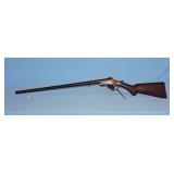 Unmarked single shot 12 gauge shotgun,