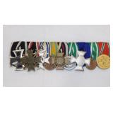 9 German military merit medals on bar pin