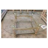 Glass top coffee table w/ brass base & wicker