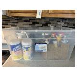 Large Clear Tote Filled with Household Cleaning