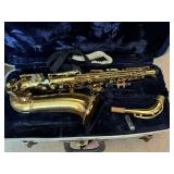 Saxophone in hard carry case