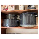 Speckled black enamel ware puts and steamers,