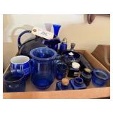 Box of blue cobalt figurines