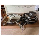 3 fry pans, 2 saute pans with lids, All-Clad