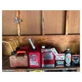 3- Red 1 Gallon gas cans, Coleman propane fuel,