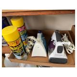 2 electric irons, 2 spray bottles starch, ironing