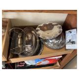Silver plated serving dishes, platters, candle