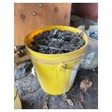 1- 5 gallon bucket of lead tire weights, wood