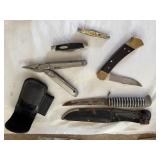 Leatherman multitool, 1 buck knife, 2 small