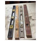 2 boxes containing hand saws. 4 levels, 4-