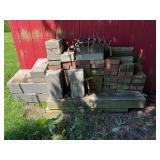 stack of bricks, solid blocks and 6x6 timber,