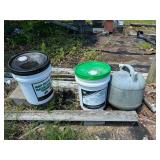 2- 5 gal buckets of tractor