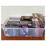 Clear Tote Filled with DVD Movies and VHS Movies