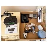 Box Containing Amazon Alexa, 4-Way Power Strip,